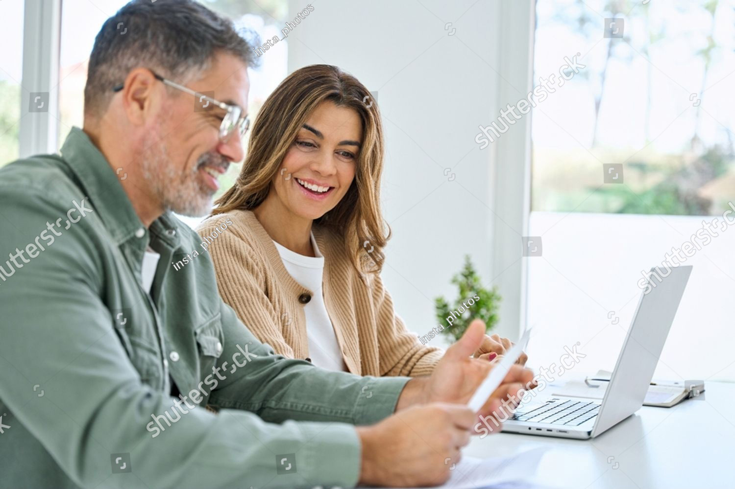 A couple reviewing financial documents together